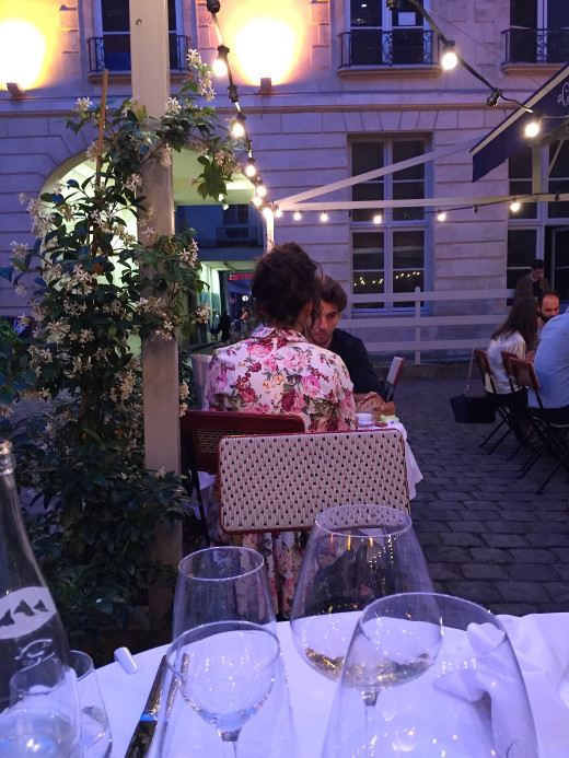 Grand Coeur courtyard shot flower dress